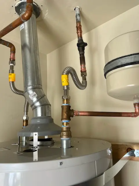 Water heater installation and plumbing repair in The Avenues